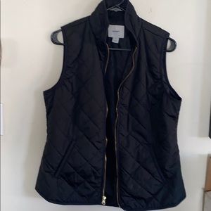 Black light quilted vest